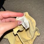 The Comfy Yellow Halter Workout Tank Photo 1