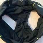 Athleta black torpedo shorts with neon piping and snakeskin print accent size XL Photo 4