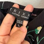 Trixxi  Clothing Company Black Floral Romper Photo 2