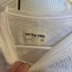 Free People white long sleeve Photo 1