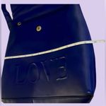 LOVE Backpack Purse Royal Blue Bendover the top & snap closure. Photo 4