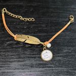 Gold Feather Charm Bracelet Photo 1