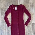 Discovery Long Sleeve Dress Photo 1