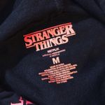 Netflix Stranger Things Red and Black Logo Hoodie Photo 6
