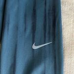 Nike  Teal and Navy Striped Leggings Size L‎ Photo 5
