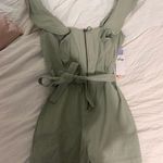 Tinseltown Ruffled Romper Photo 0