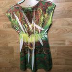 Fleurish  SIZE SMALL SURPLICE PEPLUM SHEER TOP Photo 1