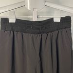 Urban Outfitters out from under swooshie black joggers size medium Photo 1