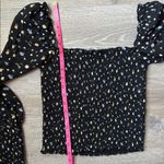 Reformation Pinto Smocked Floral-print Woven Top In Black Photo 6