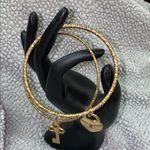 Bracelets. Lock and key charms. Gold tone Photo 0
