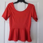 Eyelash Couture Orange U-Back Peplum blouse Photo 0