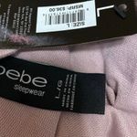 Bebe NEW  Women's Pink Rhinestone Logo V-neck Short Sleeve Tee T-shirt Top Size L Photo 3