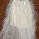 Soho Apparel  Elegant Cream High-Low Skirt Photo 0