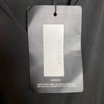 Pretty Little Thing Black Slinky Branded Trim Flared Jumpsuit Women's Size 4 Photo 8