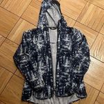 The North Face  Windbreaker Photo 0