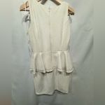 Cachet Cream Peplum Dress with Rhinestone Detail Photo 11