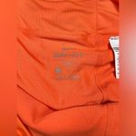 Nike  coral tennis/golf skort sz large Photo 1