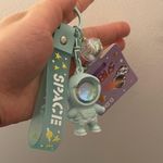 Cute cartoon Astronaut with the sunset light keychain Green Photo 3