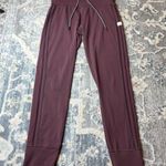 Vuori  Women's Burgundy Mauve Jogger Pants Photo 0