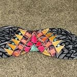 Size xs swim top perfect to pair with plain black bottoms! Good condition Photo 0