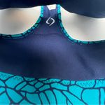 Moving Comfort  Switch it up Racer sports bra in Azure woven size XS NWT Photo 2