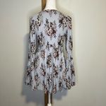 Free People  Speak Easy light blue floral v-neck bell-sleeve top size S Photo 5