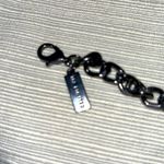 The Limited Black Oxidized Metal with Grey and Mirror-like Gems Photo 4