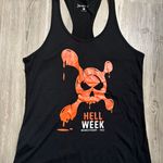 Orangetheory Size S black Racerback tank with skull and cross bones.  Pit to pit is 17, length is 25 Photo 4