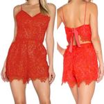 Lovers + Friends x Revolve Songbird Lace V-Neck Tie Back Romper: Red Photo 1