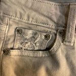 American Eagle Size 00 Super Strechy off white Jeans. Lots of Holes Photo 12