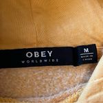 Obey  graphic hoodie, dark yellow, cotton blend, pullover hoodie, pocket, size M Photo 2