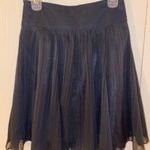 Black knee length skirt with sequin waistband and sheer overlay Photo 3