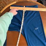 Nike ‎ Pants Blue Tight Fit Mid Rise Pull On Flare Slit Legging Size Medium Yoga Photo 6