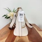 Bundle NWT Logan Duffle bag and Corner zip Wristlet With Coach Stripe Photo 6