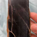 Black obsidian slab. Grayish flash running up and down. Nice piece. Photo 2