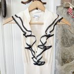 Bebe  Silk Cream Ruffle Neckline Fitted Sleeveless Babydoll Top Photo 1