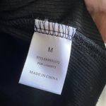 Chic Black Long Sleeve Top with White Bow Details Size M Photo 5