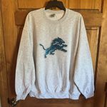 NFL Detroit Lions sweater!  Gray Sweatshirt with Blue sequins Lion Logo size XXL Photo 3
