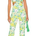 More to Come Sandy Flared Jumpsuit in Green Floral Medium Yellow Photo 0