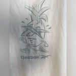Reebok XL White  tank top with pineapple and running design Photo 2