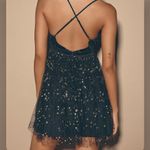 Lulus  Favorite Moment Black & Gold Star Print Backless Skater Dress  Photo 1