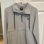 New Balance Lightweight Windbreaker Photo 0