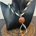 brown necklace beach Photo 1