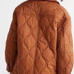 Madewell  Airpuff Shirt-Jacket in the color Warm Coffee/Rust orange. Photo 1