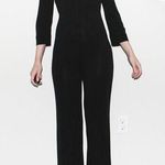Bebe vintage 90s black sexy zip v neck long sleeve jumpsuit Photo 0