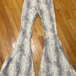 Altar'd State Snakeskin Flare Jeans Photo 0