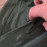 Nike  green standard fit golf shorts size small Photo 1