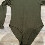 MANGOPOP NWOT  collection green turtle neck body suit. Incredibly comfy material Photo 1