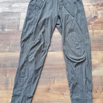 Athleta Trekkie North Jogger Pants Women’s Size 0 Olive Green Zip Pockets Hike Photo 0