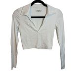 Babaton White Body Contour Cropped Long Sleeve Polo Photo 0